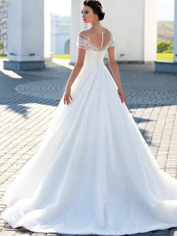 Robe de mariée féérique à paillettes - Vue de côté