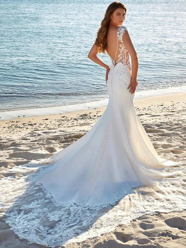 Robe de mariée de luxe sirène, détail gros plan, broderie et ornements