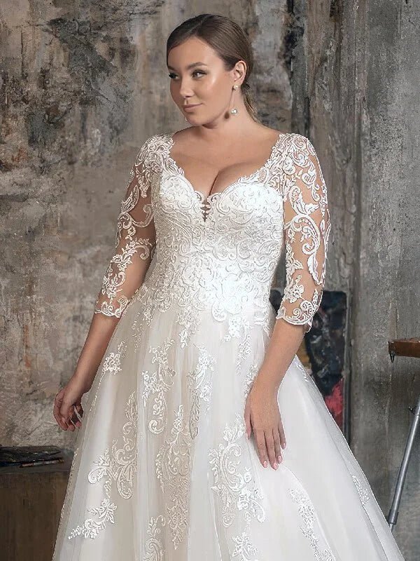 Robe de mariée grande taille fluide - Vue de dos
