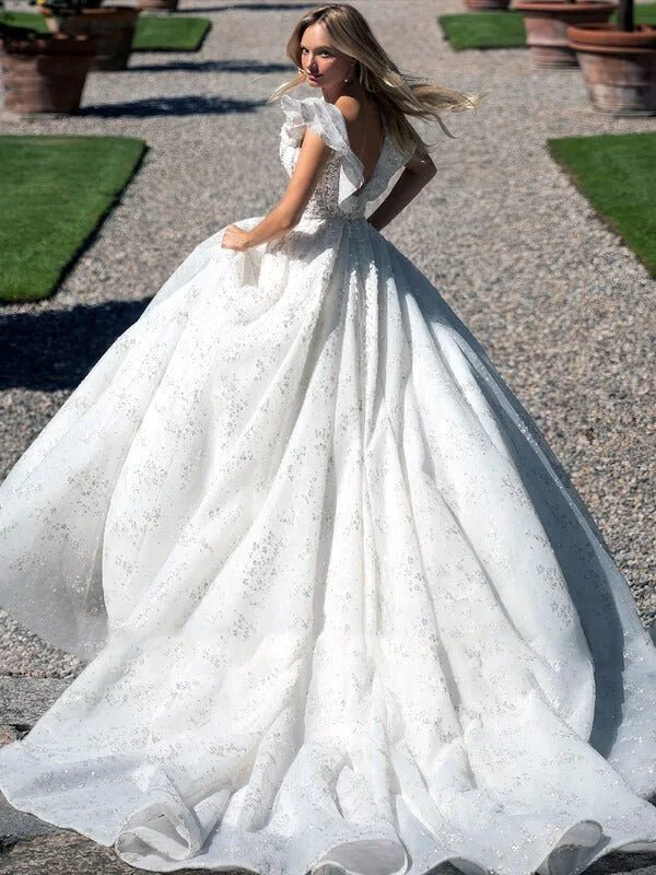Robe de mariée trapèze dentelle - Vue de côté