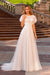 Robe de mariée taille empire en dentelle bohème, col rond, manches courtes évasées et jupe fluide en tulle
