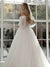 Robe de mariage princesse dentelle et satin vue de profil avec manches bouffantes