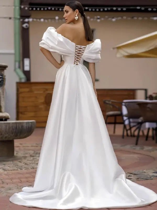 Robe de mariée fendue