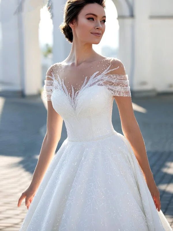 Robe de mariée féérique à paillettes