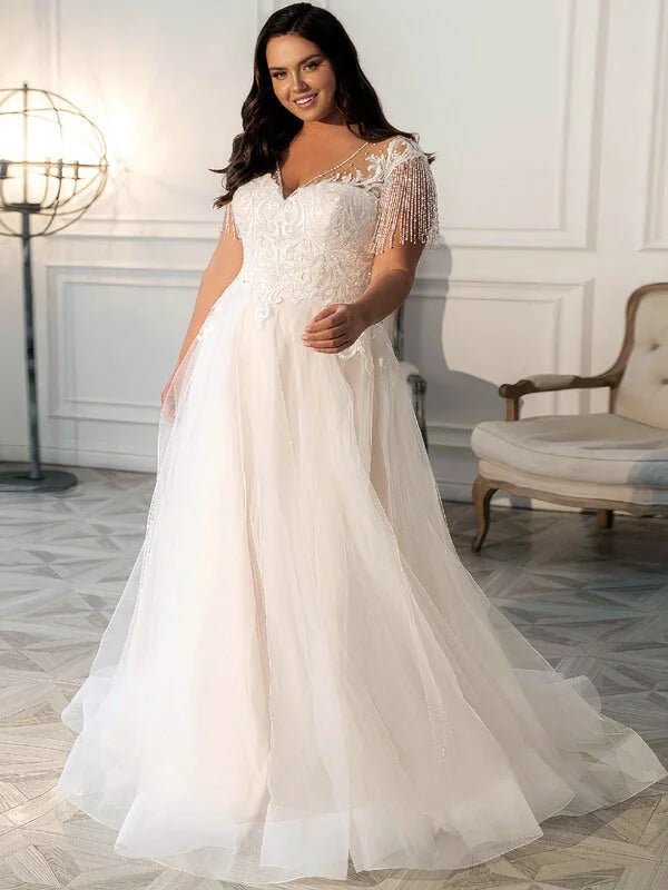 Robe de mariée grande taille avec frange