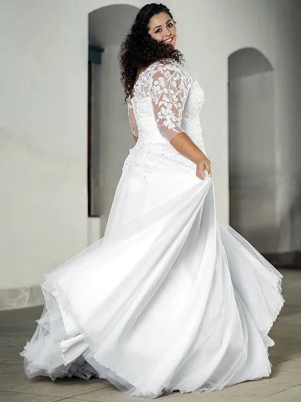 Robe de mariée Grande Taille Manches 3/4, détail gros plan, broderie et ornements