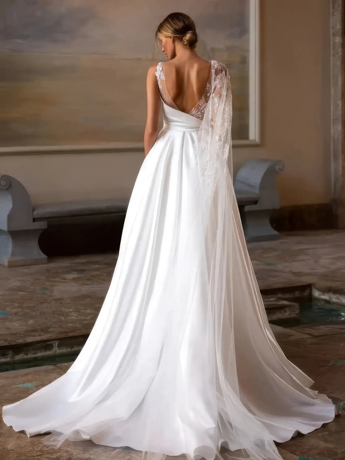 Detail des broderies perlees du bustier de la robe de mariee princesse luxe
