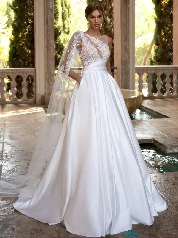 Robe de mariee princesse luxe vue de face avec jupe volumineuse en tulle brode